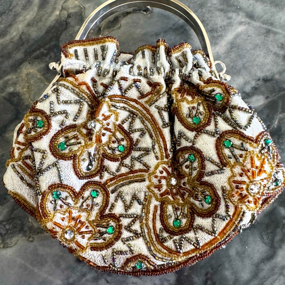 Adorable handbag perfect with any color outfit.